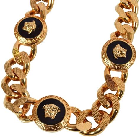 gold and black versace|Versace gold jewelry for men.